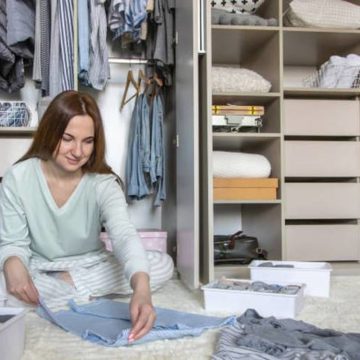 woman-organizing-closet