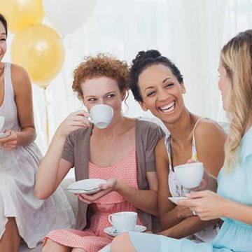 friends-drinking-tea-and-chatting-at-a-party