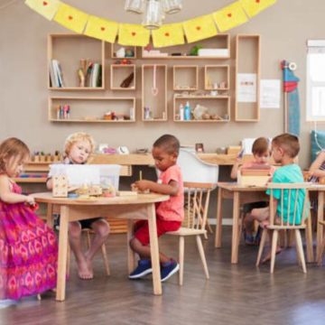 pupils-working-at-tables-in-montessori-school