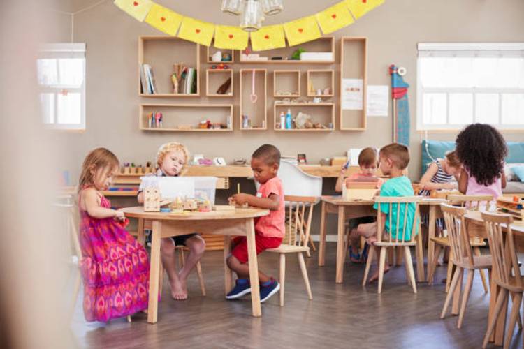 pupils-working-at-tables-in-montessori-school