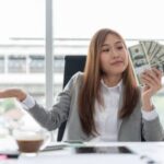 woman-cash-happy
