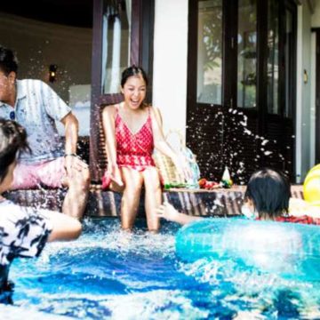 family-playing-pool