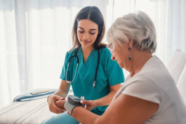 woman-elderly-nurse-healthcare-home